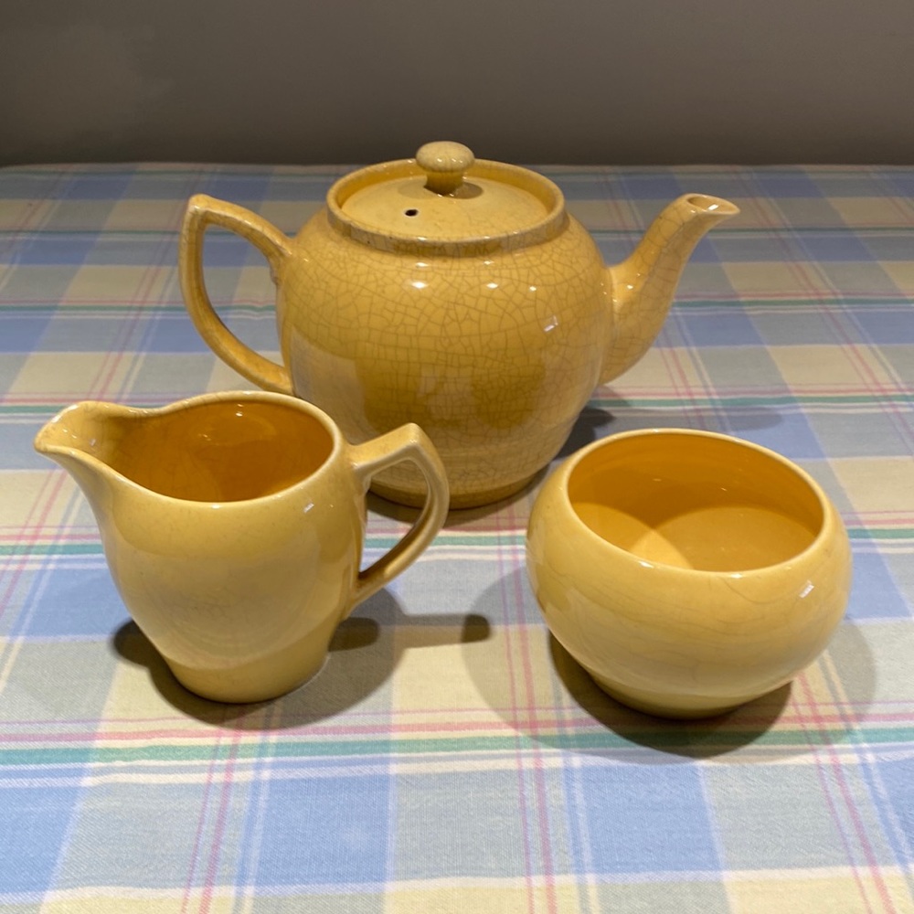 Beautiful Staffordshire teapot creamer and sugar made in England.